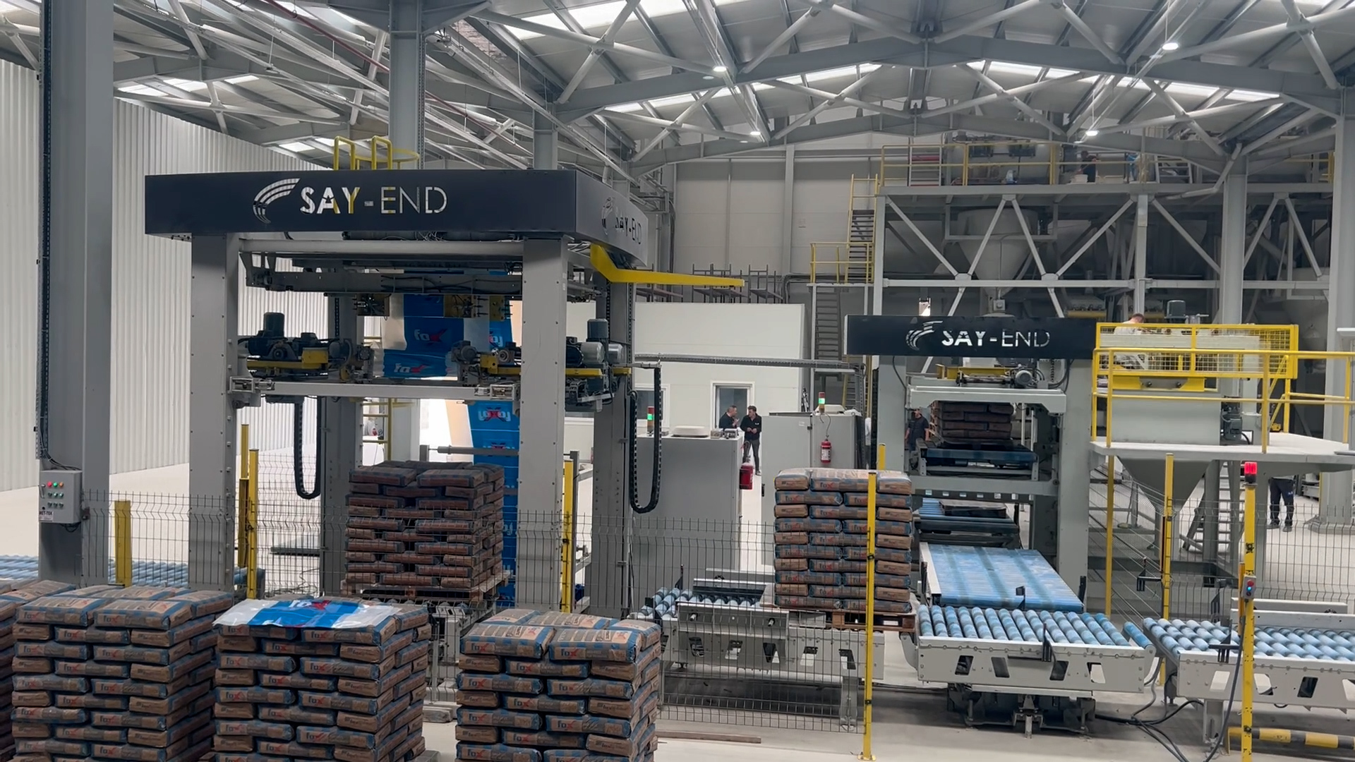 PALLETIZING, STRETCH WRAPPING, AND ROBOT LINE